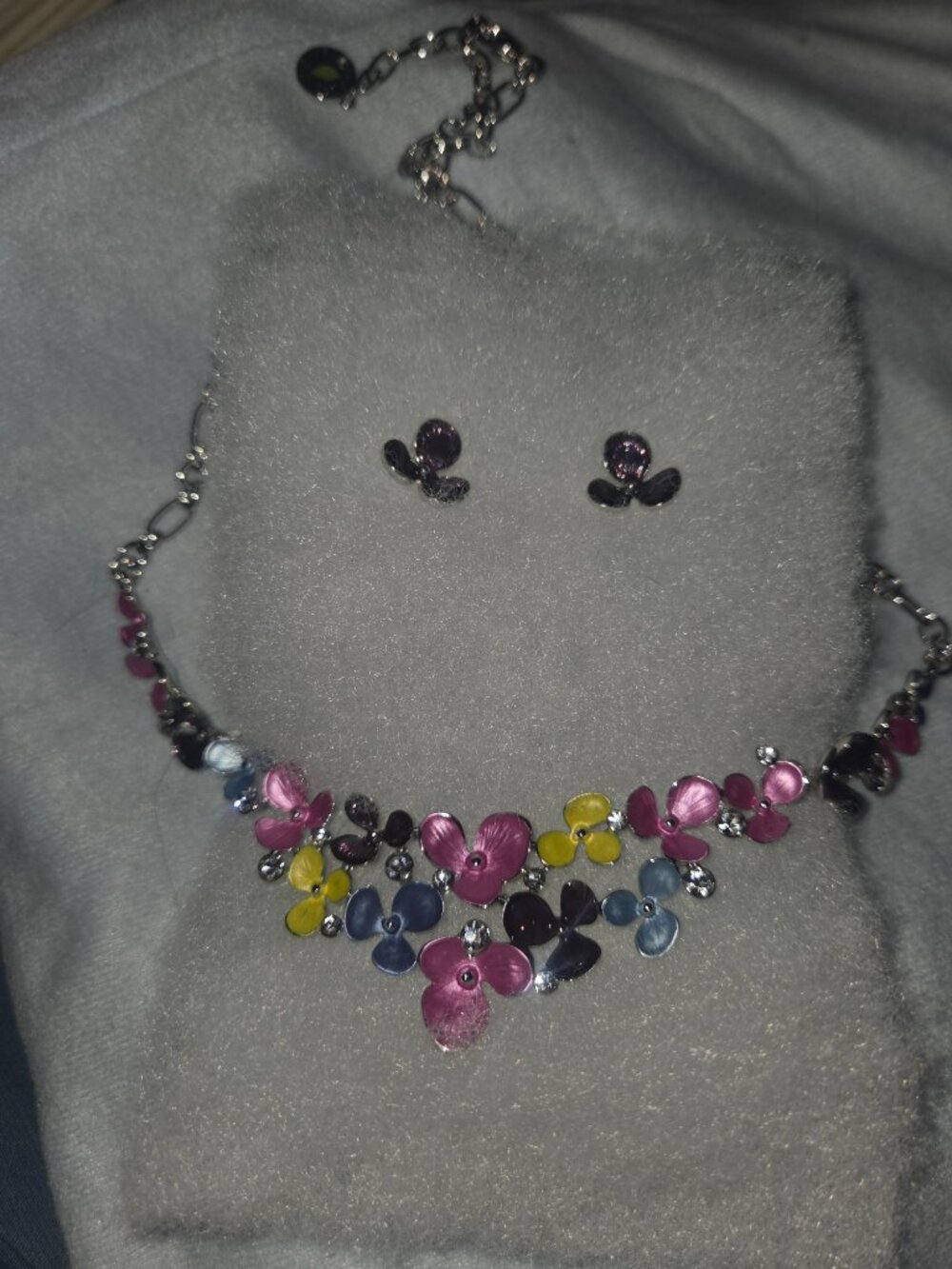 Floral and Jewels pink, blue, purple and yellow tones with purple earrings